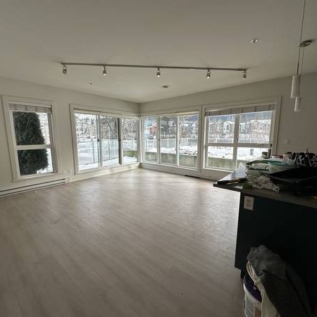 Ground floor waterfront two bedroom + den unit at Mistral (102) - Photo 3