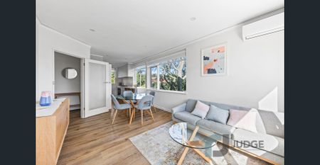 Contemporary Comfort with Urban Convenience - Photo 2