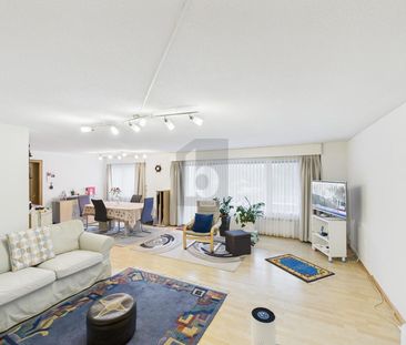 GENEROUS IN FAMILY-FRIENDLY NEIGHBORHOOD - Photo 1