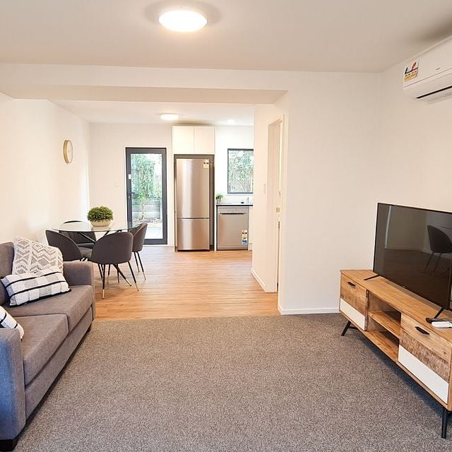 Modern Townhouse in Central City with Garage - Photo 1