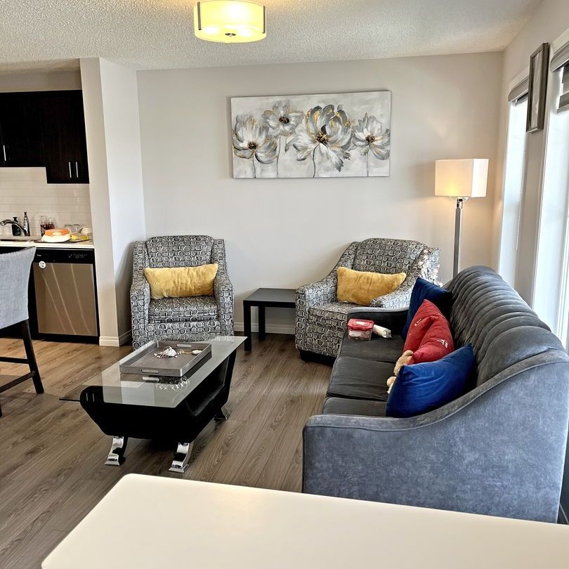 10799 Cityscape Drive NE | Townhouse | 3-bedroom, 2.5-bathroom | Double Garage - Photo 1