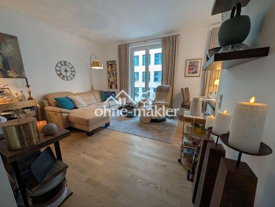 Exklusives Neubau-Apartment im "PURE Living" mit Wasserblick - Photo 1