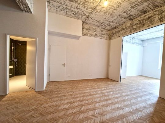 Modernes 3-Zimmer-Loft mit Industriecharme und freistehender Badewanne - Photo 1