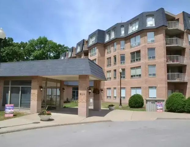 LUXURIOUS CONDO PRESTIGIOUS MOUNT CARMEL | 8111 Forest Glen Drive, Niagara Falls - Photo 1