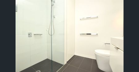 Stunning Two Bed Apartment on Level 16 with Bay Views! - Photo 4