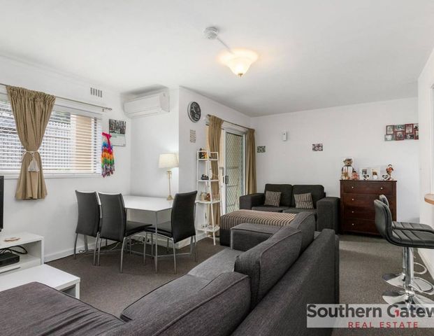 Charming Ground Floor Unit in Secure Complex - Photo 1