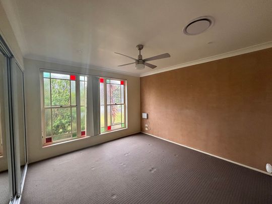 Big Family Home, No Mowing Required! - Photo 1