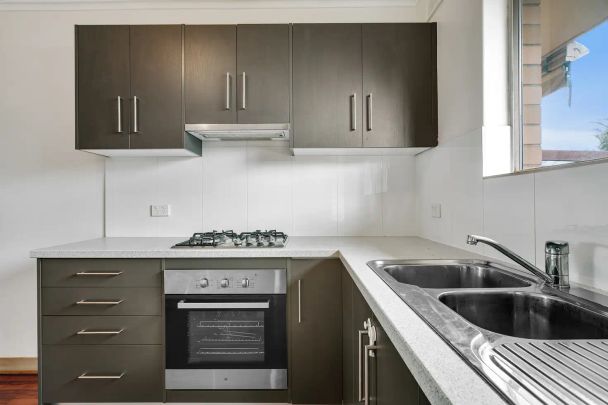 “Outstanding Unit - Updated & Ready To Go!” - Photo 1