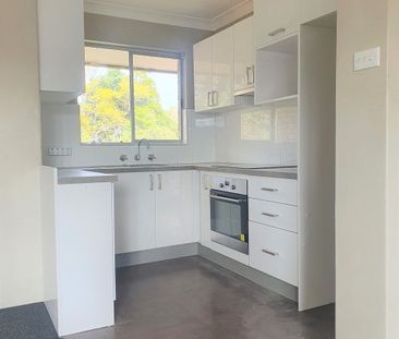 Modern 2 bedroom unit in Prime CBD location - Photo 1