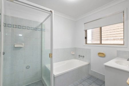 Modern Three-Bedroom Home with Private Courtyard and Entertaining Spaces - Photo 3