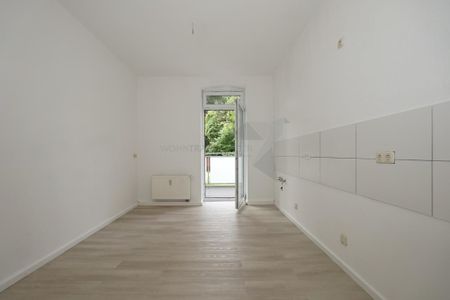 Geräumige Erdgeschoss-Wohnung mit saniertem Bad und Balkon - Photo 4