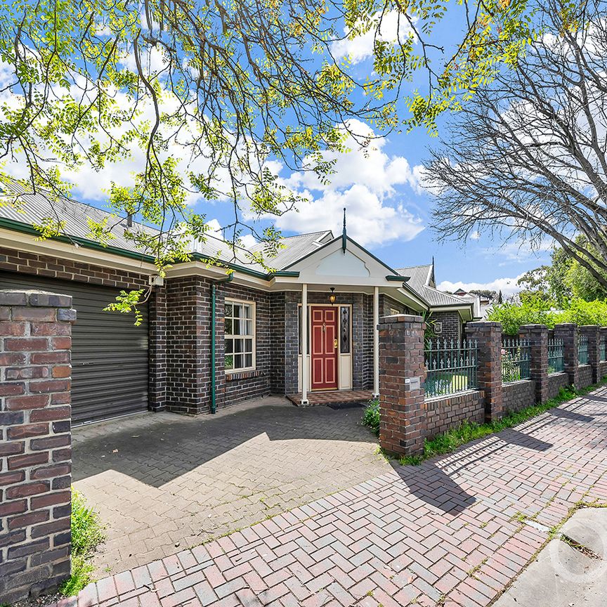 Open the Door to Effortless Family Living on Olive - Photo 1