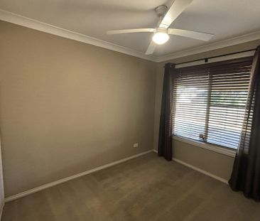 COMFORTABLE FOUR BEDROOM FAMILY HOME - Photo 2