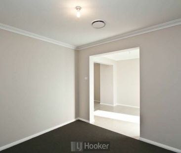 Spacious Family Home with Multiple Living Areas - Photo 2