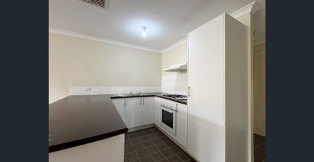 Low-Maintenance Living in a Secure Complex with Pool Access - Photo 4