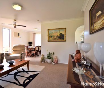 Neat and Inviting Home with Enclosed Carport - Photo 1