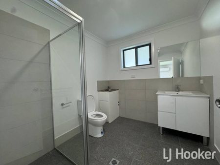 Modern 2-Bedroom Unit with Fully Fenced Yard - Photo 5