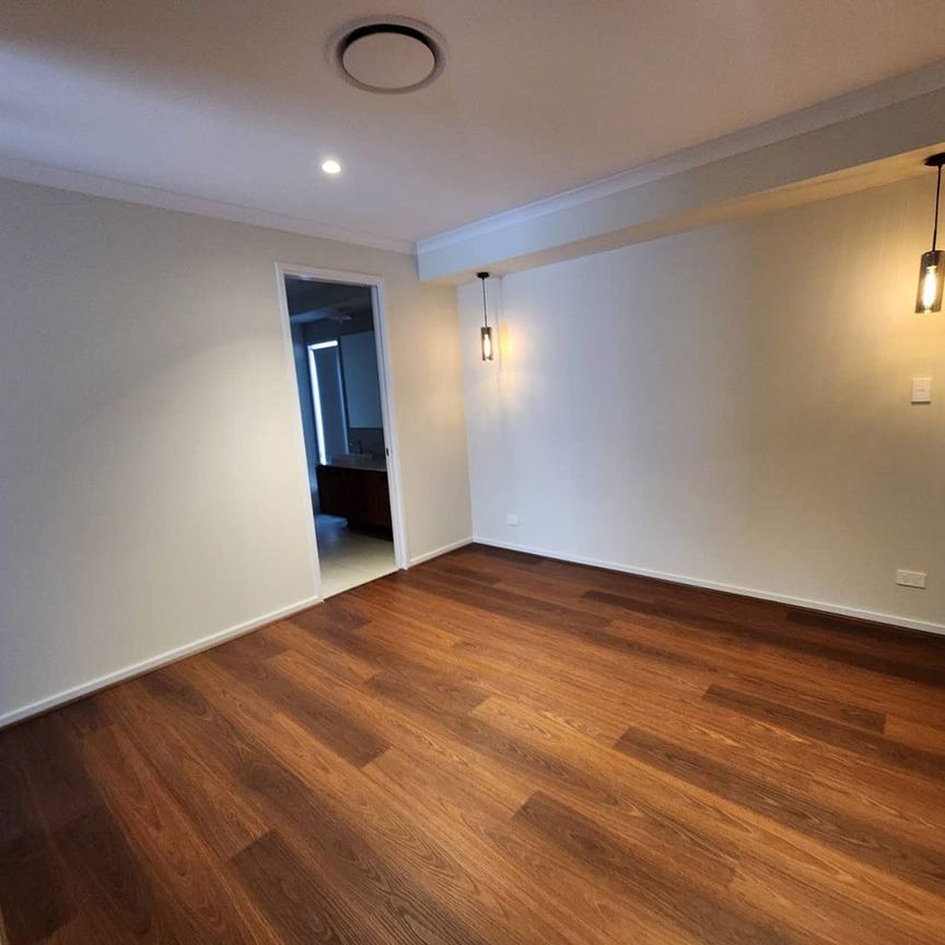 Designer Family Residence | 4 Bedrooms + Media Room | Ducted Air | Premium Finishes - Photo 1