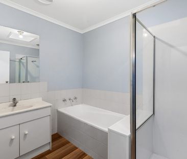 Presentable 2 bedroom unit with outdoor space and carport - Photo 5