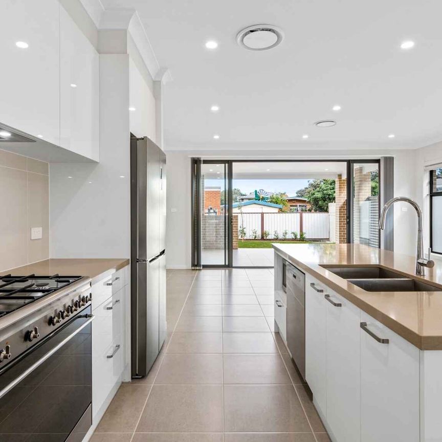 MODERN PET FRIENDLY DUPLEX IN HEART OF LITTLE BAY! - Photo 1