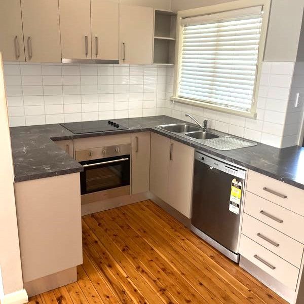 Convenient One Bedroom Beauty! - Photo 1