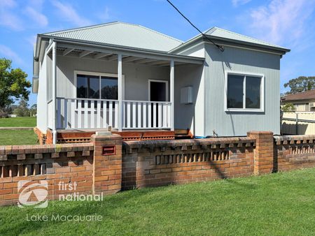 RENOVATED 2 BEDROOM UNIT - LAWN MAINTENANCE INCLUDED - Photo 5