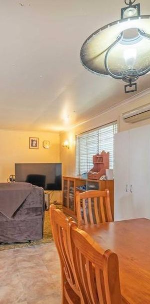 Spacious Family Home on Nearly Half an Acre - Just Minutes to CBD & Bargara Beach - Photo 1