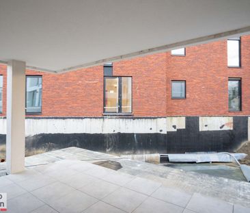 Gelijkvloers nieuwbouwappartement met terras en tuintje - Photo 4