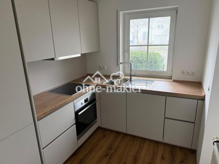 Renovierte Erdgeschosswohnung mit Garten und EBK in Rheinnähe - Photo 2