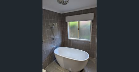 Four bedrooms home with secure parking | Available 2/12/25 - Photo 4