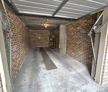 IMPECCABLY RENOVATED APARTMENT OFFERING COMFORT, STYLE AND CONVENIENCE - Photo 1