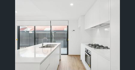 Sleek, Brand-New Middle Townhouse in Victoria Park — Designed for Space, Comfort & Modern Living - Photo 4