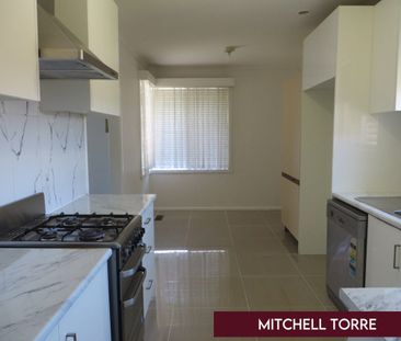 Neat & Tidy Family Home in Prime Location - Photo 5