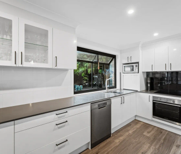 Discover coastal living at its finest - Photo 5