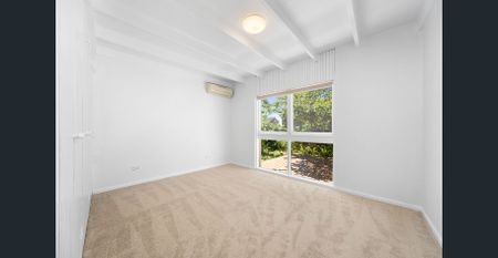 Beautifully Renovated Four-Bedroom Home with Spacious Outdoor Living - Photo 4