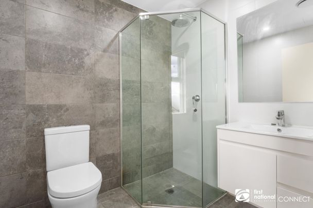 Convenient and contemporary living! - Photo 1