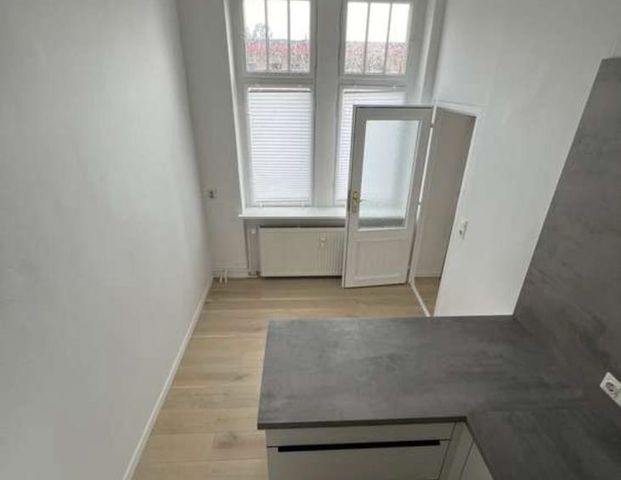 Helle renovierte Altbauwohnung - Foto 1