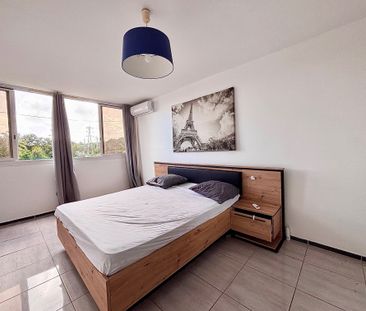 Location Appartement 4 pièces 82m² LES ABYMES 97139 - Photo 3