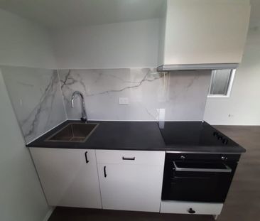 STREET FRONTAGE, PRVIATE ENTRY & CARPORT! - Photo 1