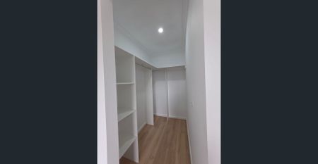 Corner-Block Comfort with Serene Creek Views - Photo 2