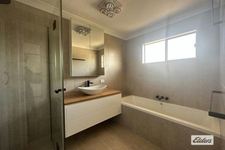 Spacious Home With 2 x Sheds - Photo 5