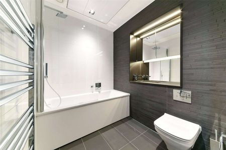 Set within the distinguished core of Canary Wharf’s financial quarter, Amory Tower offers a striking expression of contemporary city living. - Photo 2