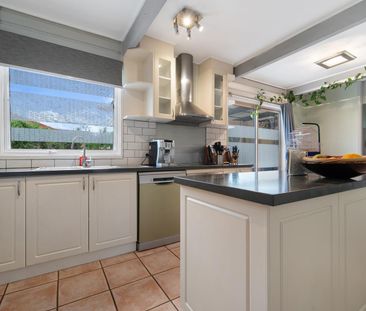 Family Living with beautifully landscaped gardens in a great location - Photo 3