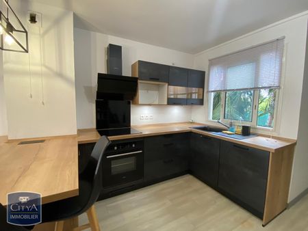 Location Appartement 3 pièces 63m² LA POSSESSION 97419 - Photo 2