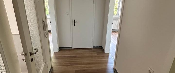 Charmante 3 Zimmer Wohnung mit Garten und Garage - Foto 1