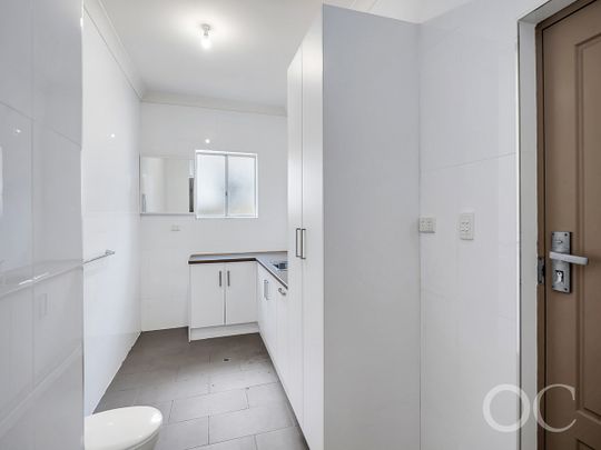 Open the Door to Style, Security, and Location in Woodville South - Photo 1