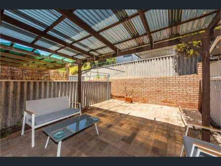 Coastal Charm Meets Convenience - Photo 2