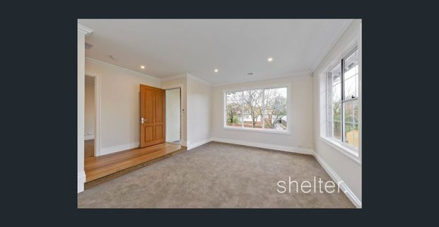 Modern Family Living | 5 Bedrooms + Substantial Living Space - Photo 1