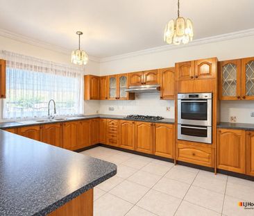 Spacious 4-Bedroom Home with Versatile Living - Photo 6