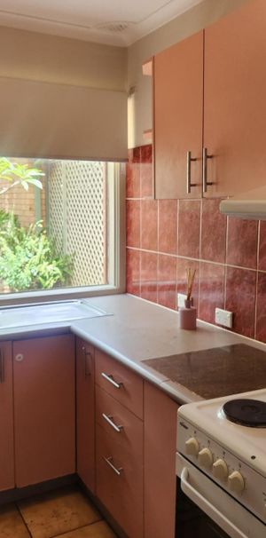 Centrally Located Three-Bedroom Townhouse - Photo 2